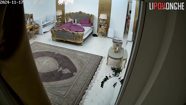 They don't yet know that there is a hidden camera in their bedroom