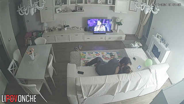 Friends are watching all their actions in the living room with a hidden cam