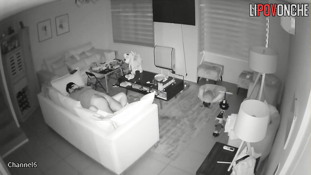 Active sex in the missionary position on a soft sofa