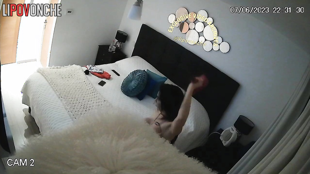 Busty topless brunette drying her dark long hair, look