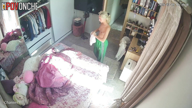 Sexy webcam model dressing for work in the morning, solo bedroom scene