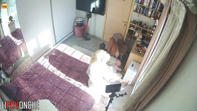 Sexy webcam model dressing for work in the morning, solo bedroom scene