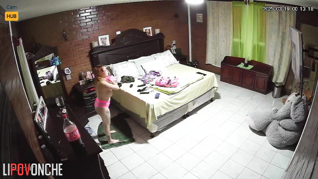 Topless woman dressing for a date, she wanna sex this night