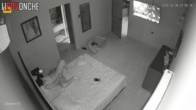 Young Colombian girl plays with her wet pussy while watching tv and phone