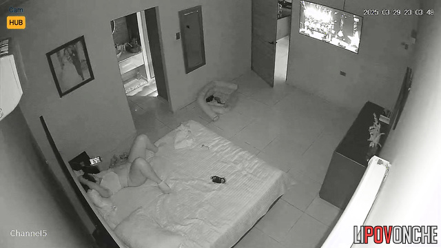 Young Colombian girl plays with her wet pussy while watching tv and phone