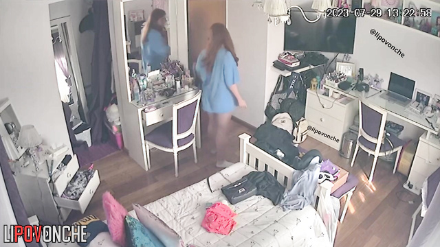 Relative of this sexy redhead helps her to pick the best outfit for date