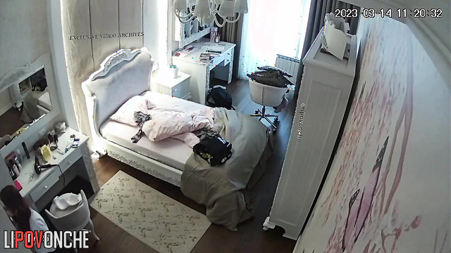 She's waiting for her boyfriend in the bedroom and he's late