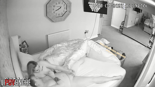 Bored tattooed wife takes her husband's cock out of his pants and strokes it