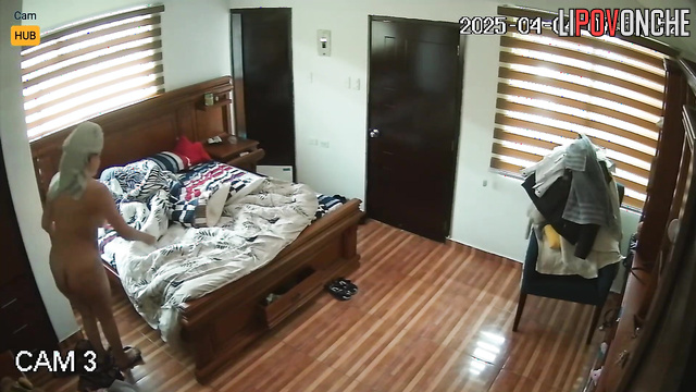Hidden camera from the bedroom: Chubby big-breasted Latina changing clothes
