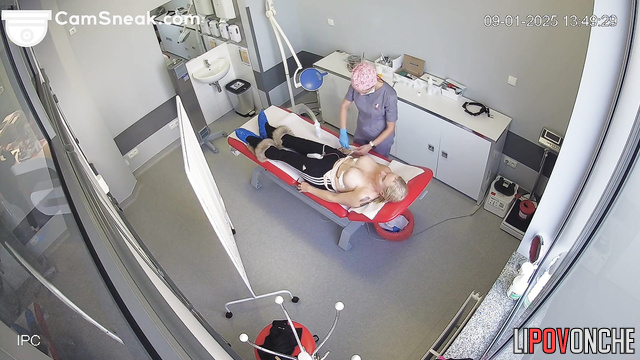 Big-breasted blonde at the doctor's office. Look at her tits