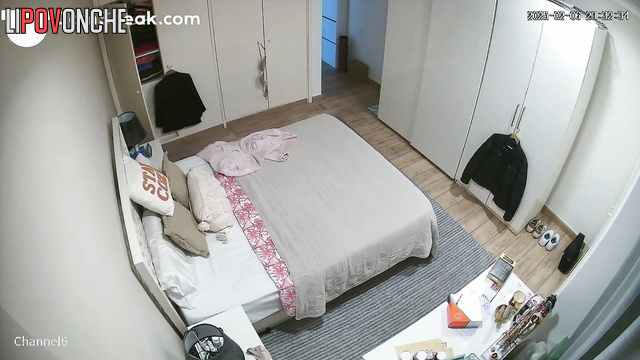 Private video of a busty beauty completely undressing before bedtime