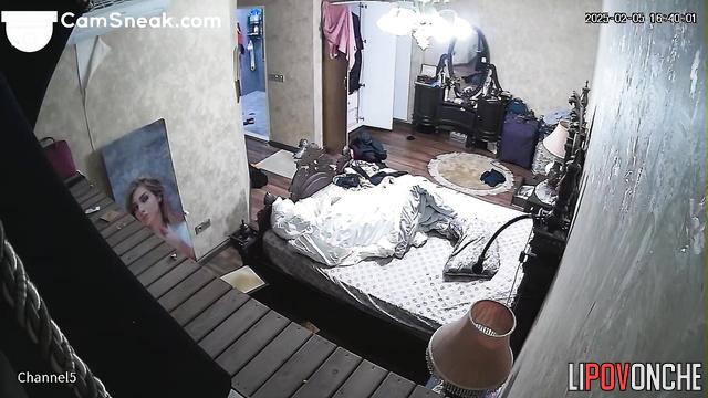 She walking around the room without a bra and talking on the phone