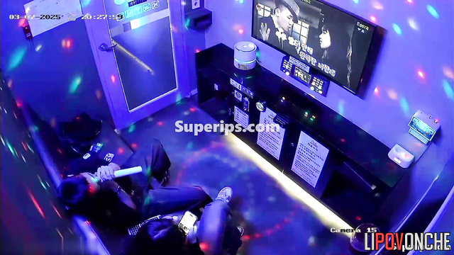 Korean woman loves to jerk off her lover while singing karaoke