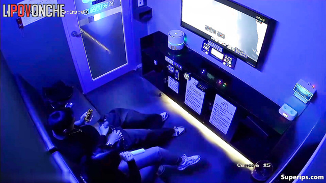 Korean woman loves to jerk off her lover while singing karaoke