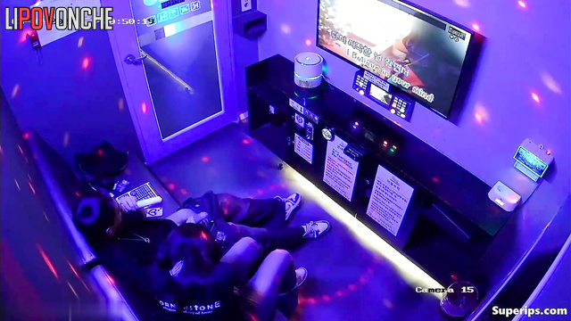 Korean woman loves to jerk off her lover while singing karaoke