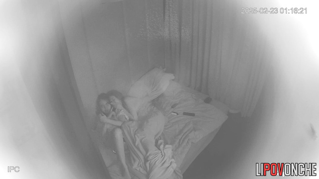 Two lesbian Ukrainians spend a free evening in bed in each other's arms