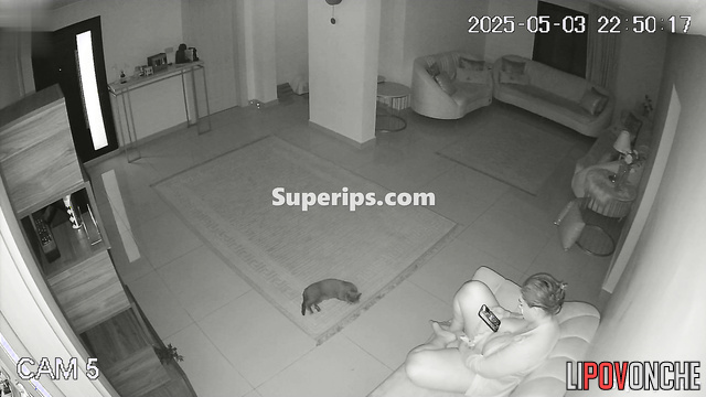 Chubby girl masturbating her big clit in the living room