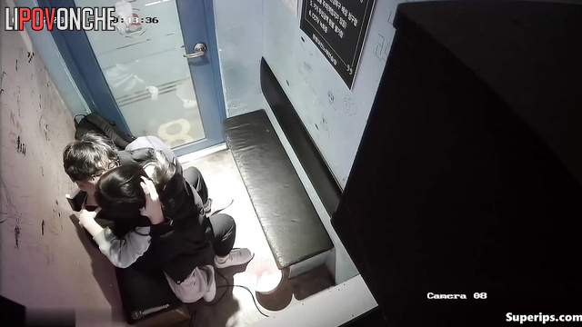 Asian couple kissing in karaoke booth (teens having fun)