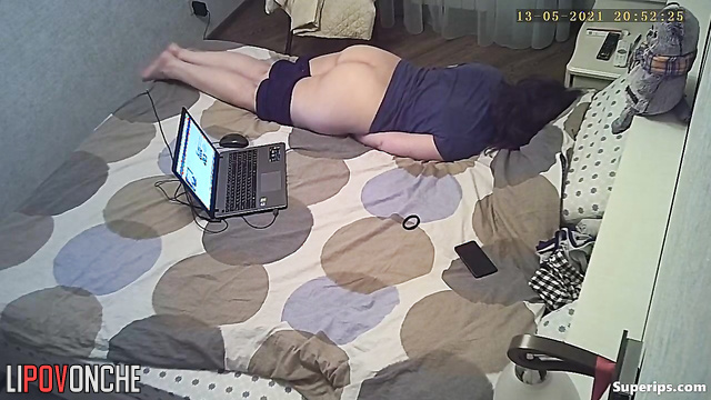 Chubby lady enjoying herself lying on bed, solo video