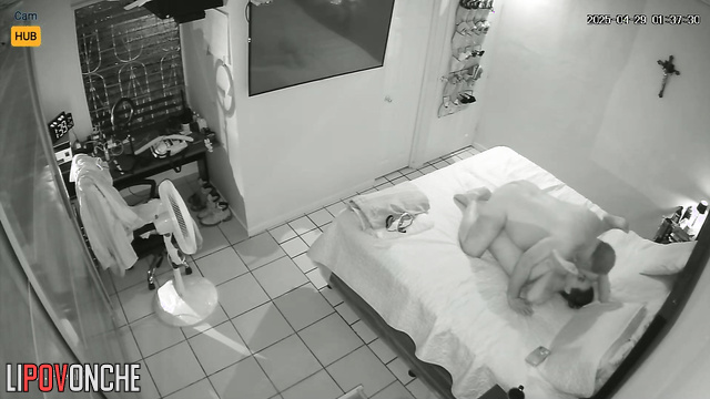 Tanned people relaxing on bed naked, look at this