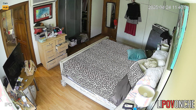 Blonde walks around the room and doesn't realize that she is being watched