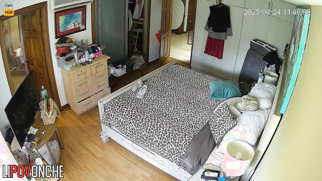 Blonde walks around the room and doesn't realize that she is being watched
