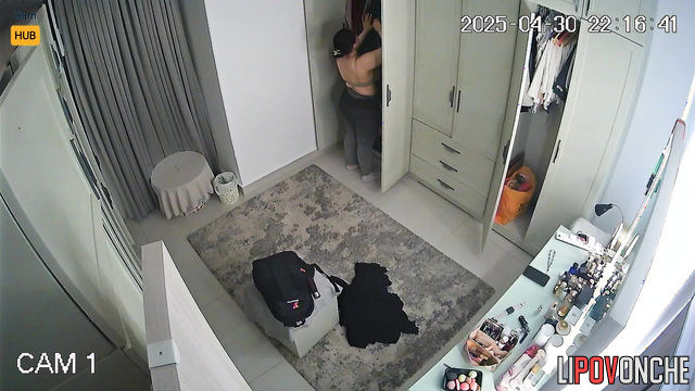 Big beauty brunette tries to decorate her body with a new outfit
