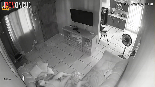 Bald and naked guy fucking his girl on a leather sofa