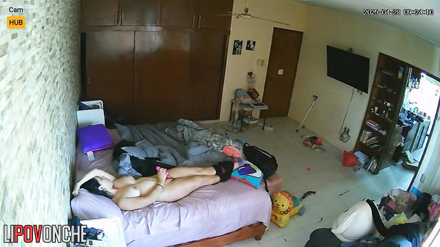 Naked and gorgeous lady playing with a pink sex toy