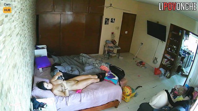 Naked and gorgeous lady playing with a pink sex toy