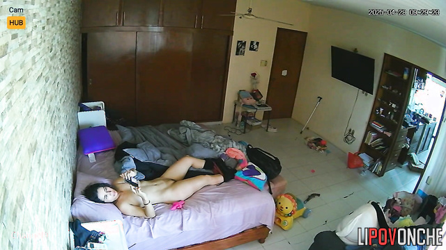 Naked and gorgeous lady playing with a pink sex toy