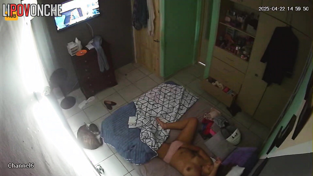 Bored Latina plays with her wet pussy while watching an interesting movie
