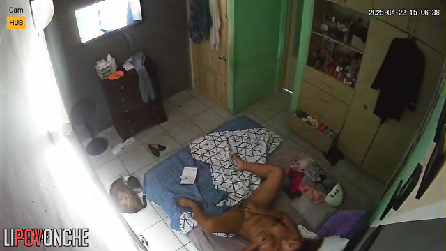Bored Latina plays with her wet pussy while watching an interesting movie