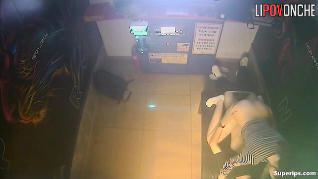 Young asian couple making dirty things in the karaoke club