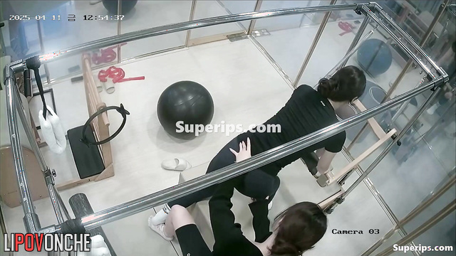 Sporty asian girls training in the gym, hidden camera