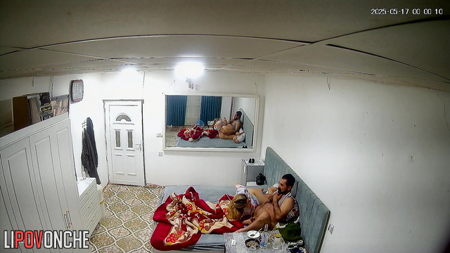 Watch in the mirror as the husband secretly sticks his finger in his wife's vagina