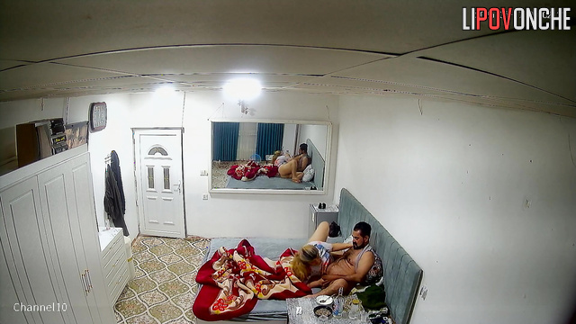 Watch in the mirror as the husband secretly sticks his finger in his wife's vagina