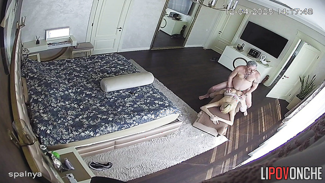 Blonde in sexy lingerie bows down to her husband to take his cock in her mouth
