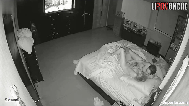 The TV being on is no obstacle to their night passion