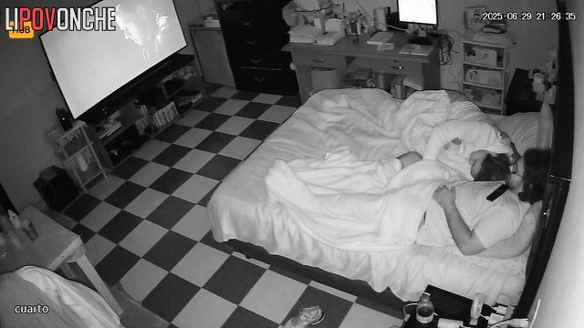 Two adult people relaxing after work in oral way, home tape