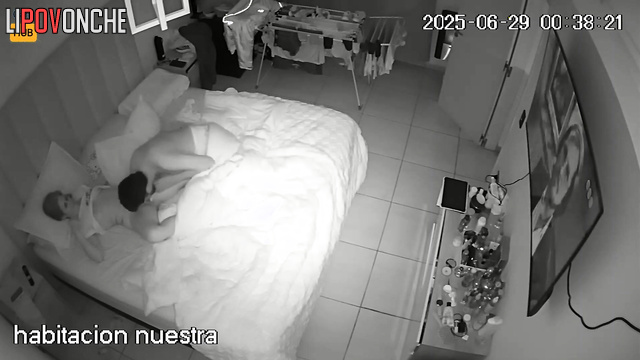 Couple not only watching TV but also doing other things