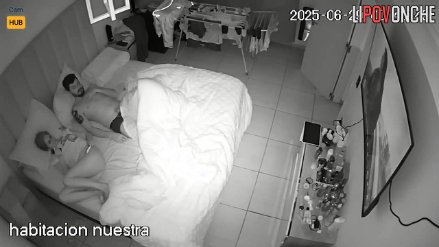 Couple not only watching TV but also doing other things