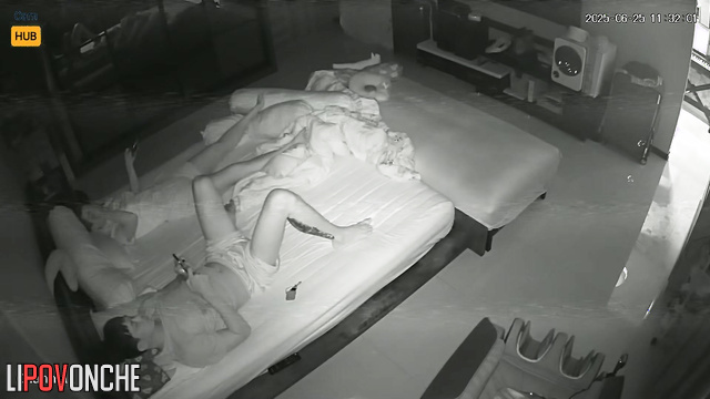 He lazily climbed onto her and then they took their phones in their hands