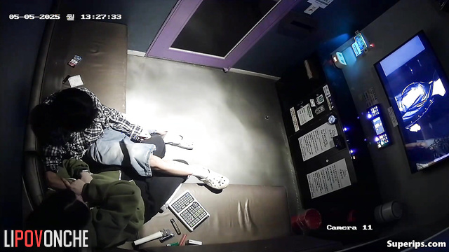 Young Asian girl gives her boyfriend a fantastic blowjob in a karaoke room