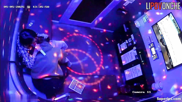 Young Asian girl gives her boyfriend a fantastic blowjob in a karaoke room