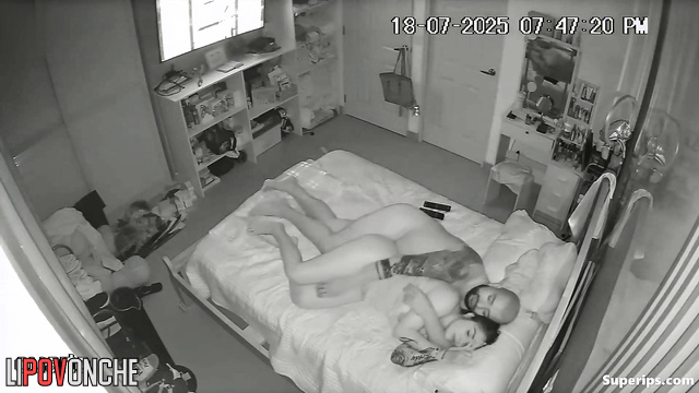A sleepy tattooed cutie covers her mouth with her hand to hide the agony of orgasm