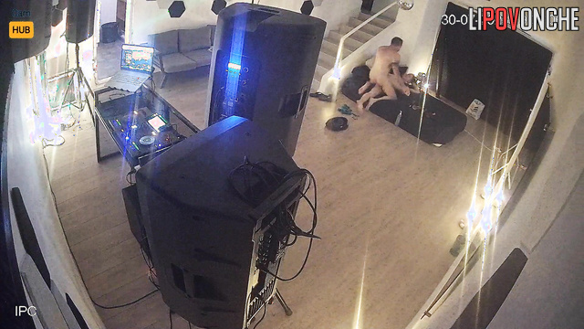 People kissing leisurely in the huge living room, look