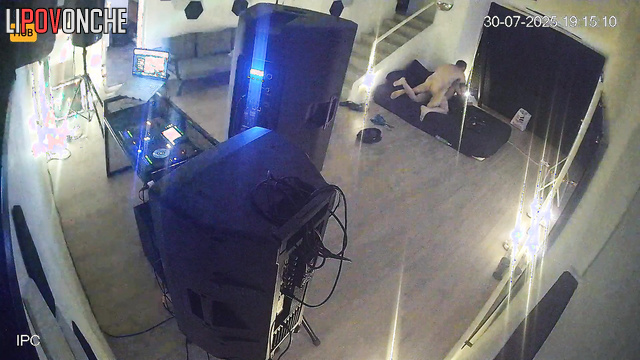 People kissing leisurely in the huge living room, look