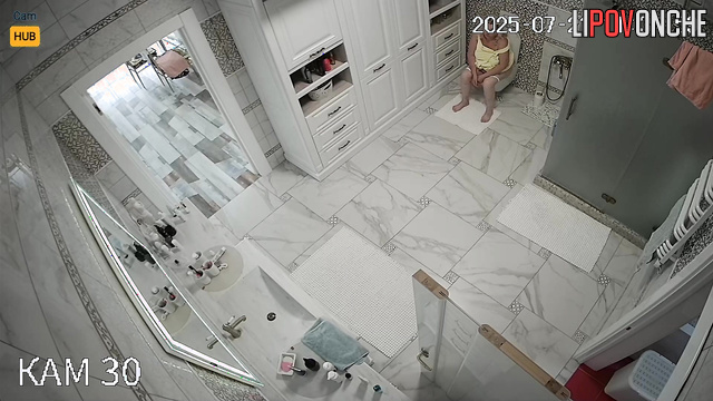 Blonde peeing, not knowing each move is captured, look