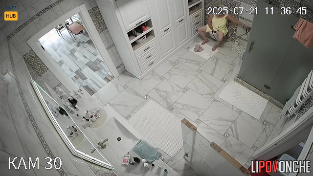 Blonde peeing, not knowing each move is captured, look